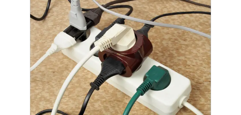 An extension cord with multiple appliances connected